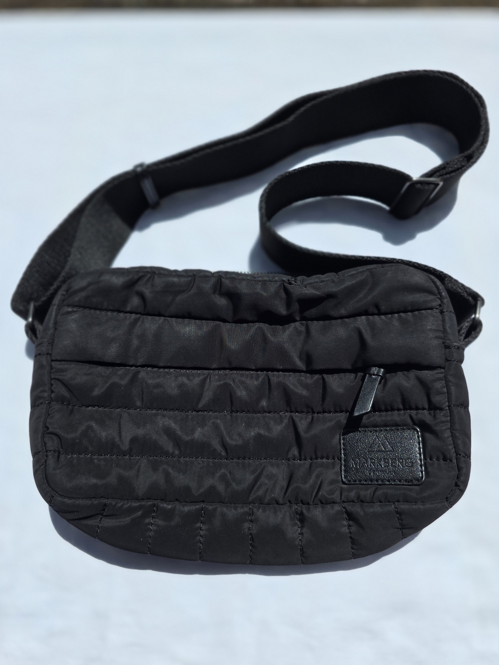 The Markberg Denise Crossbody Bag is a highly practical quilted purse